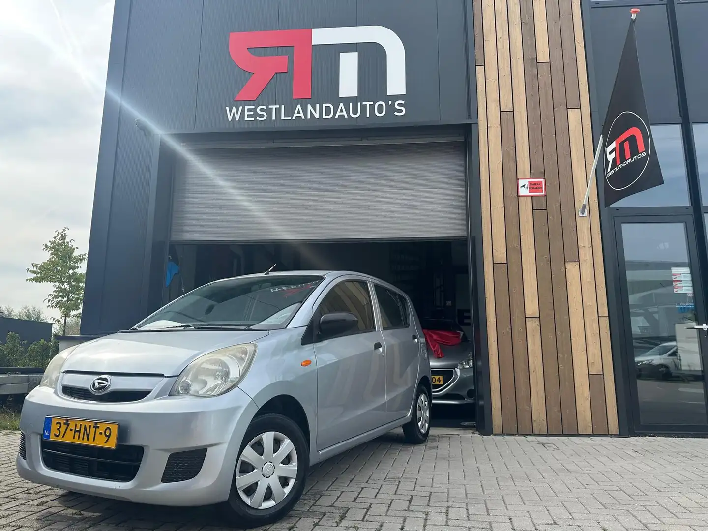 Daihatsu Cuore 1.0 Trend dealer onderhouden NIEUWE APK 2 sleutels Gris - 2
