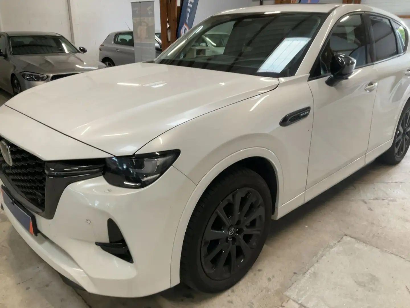Mazda CX-60 2.5 e-Skyactiv Plug-in Hybrid Homura AWD - 1