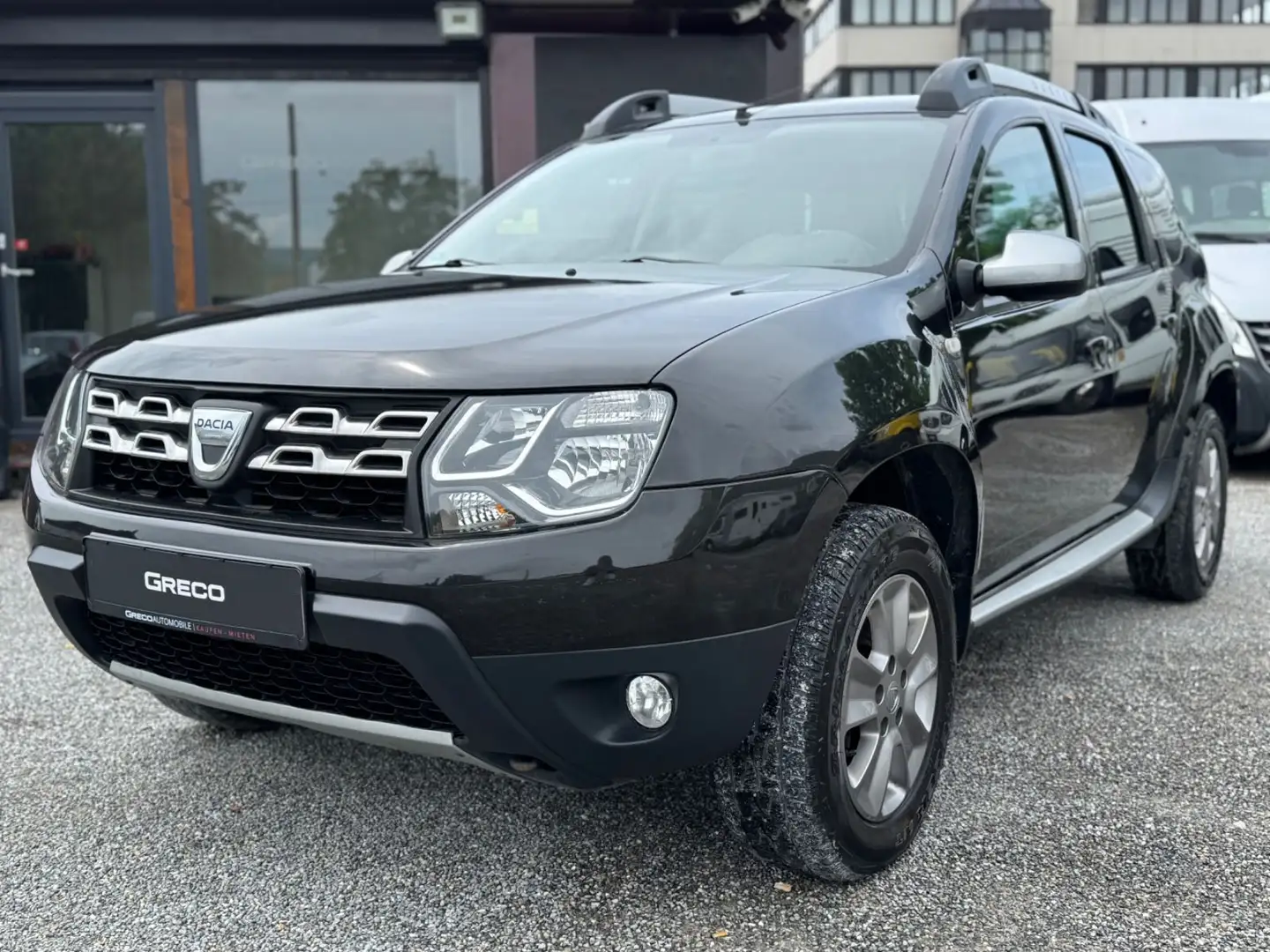 Dacia Duster 1.6 Prestige 4x4 | Navi | Leder | Tempo Schwarz - 1