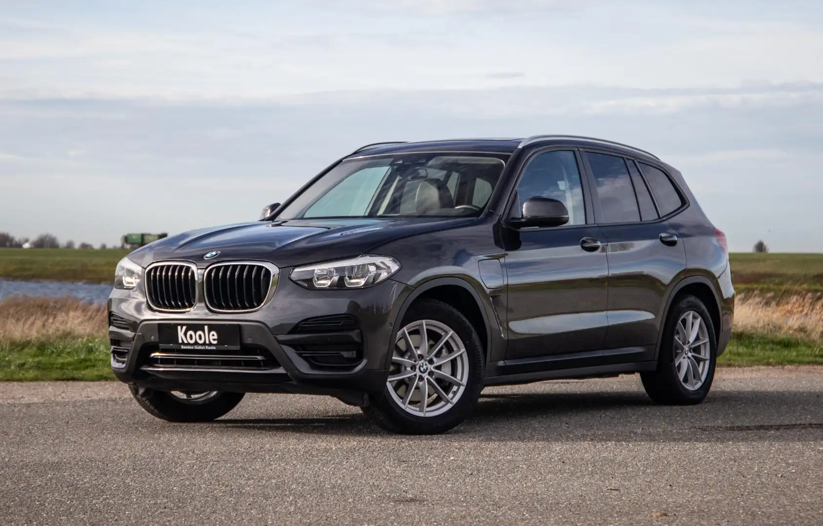 BMW X3 xDrive30e High Executive BRUIN LEER / PANORAMA DAK Grijs - 2