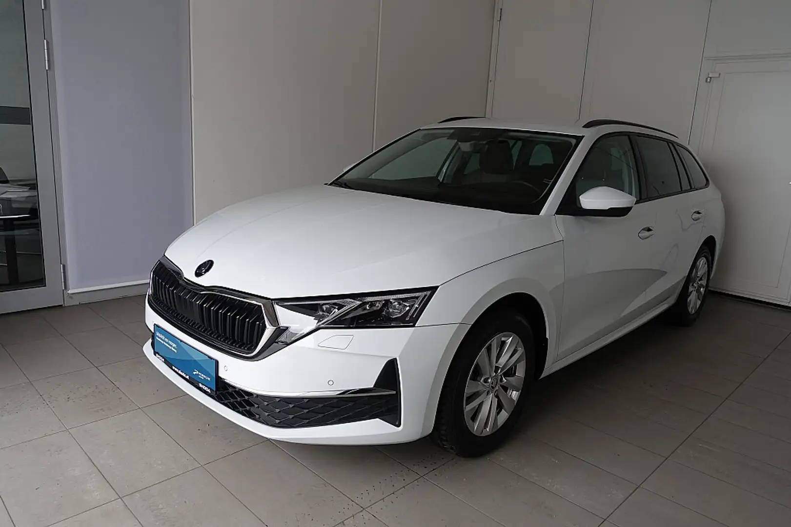 Skoda Octavia Kombi 1,5 TSI Selection Weiß - 1