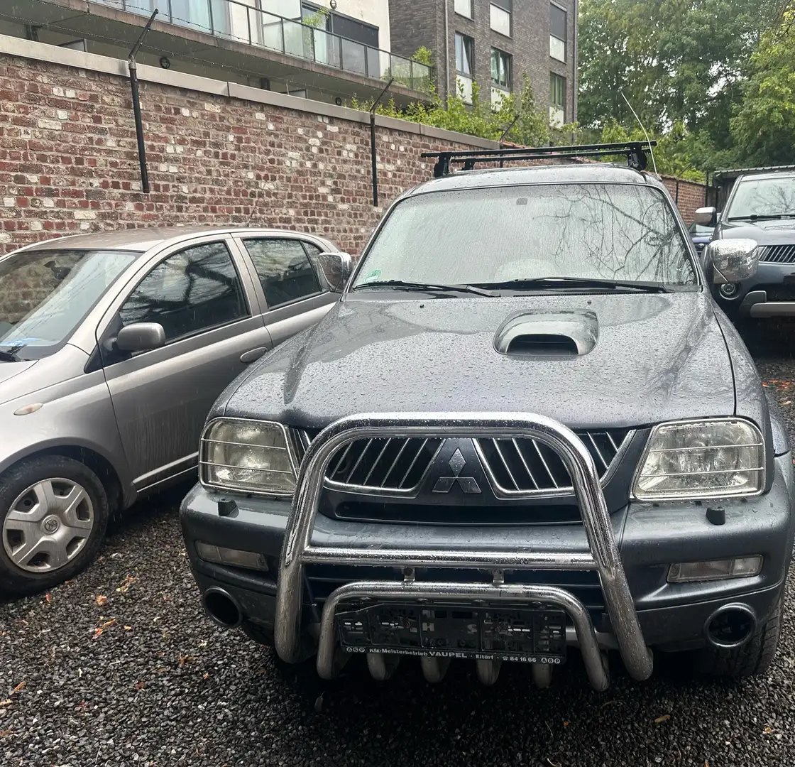 Mitsubishi L200 2.5 Tdint. 4WD clean car face-lift 0032485905657 - 1