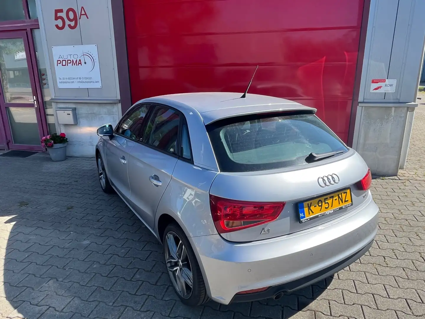 Audi A1 Sportback 1.4 TDI 90pk Sport Pro Line Navigatie / Grigio - 2