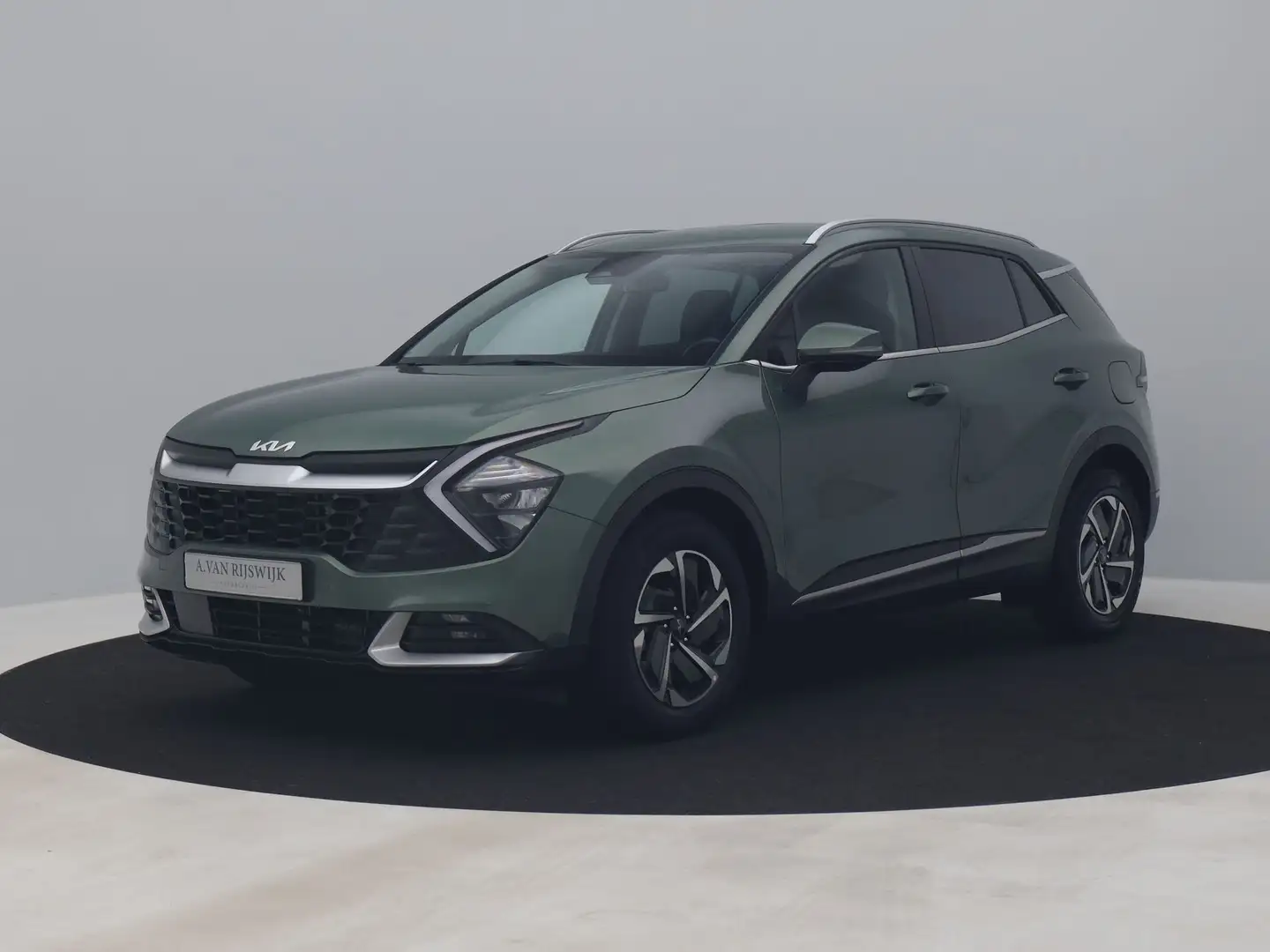 Kia Sportage 1.6 T-GDI Hybrid DynamicLine | CAMERA | NAVI | CAR Groen - 1