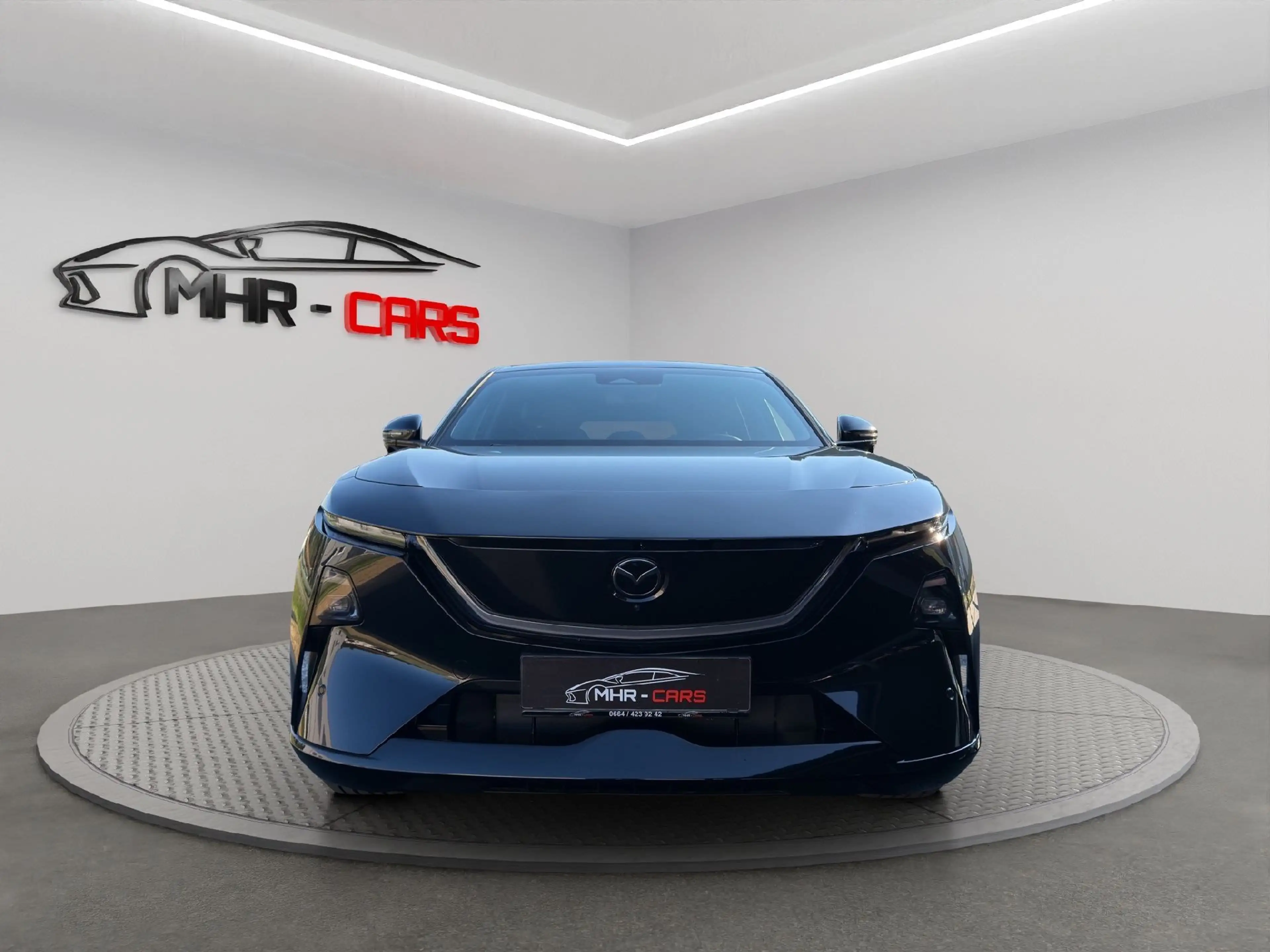 Mazda CX-6e EV Takumi — photo 8