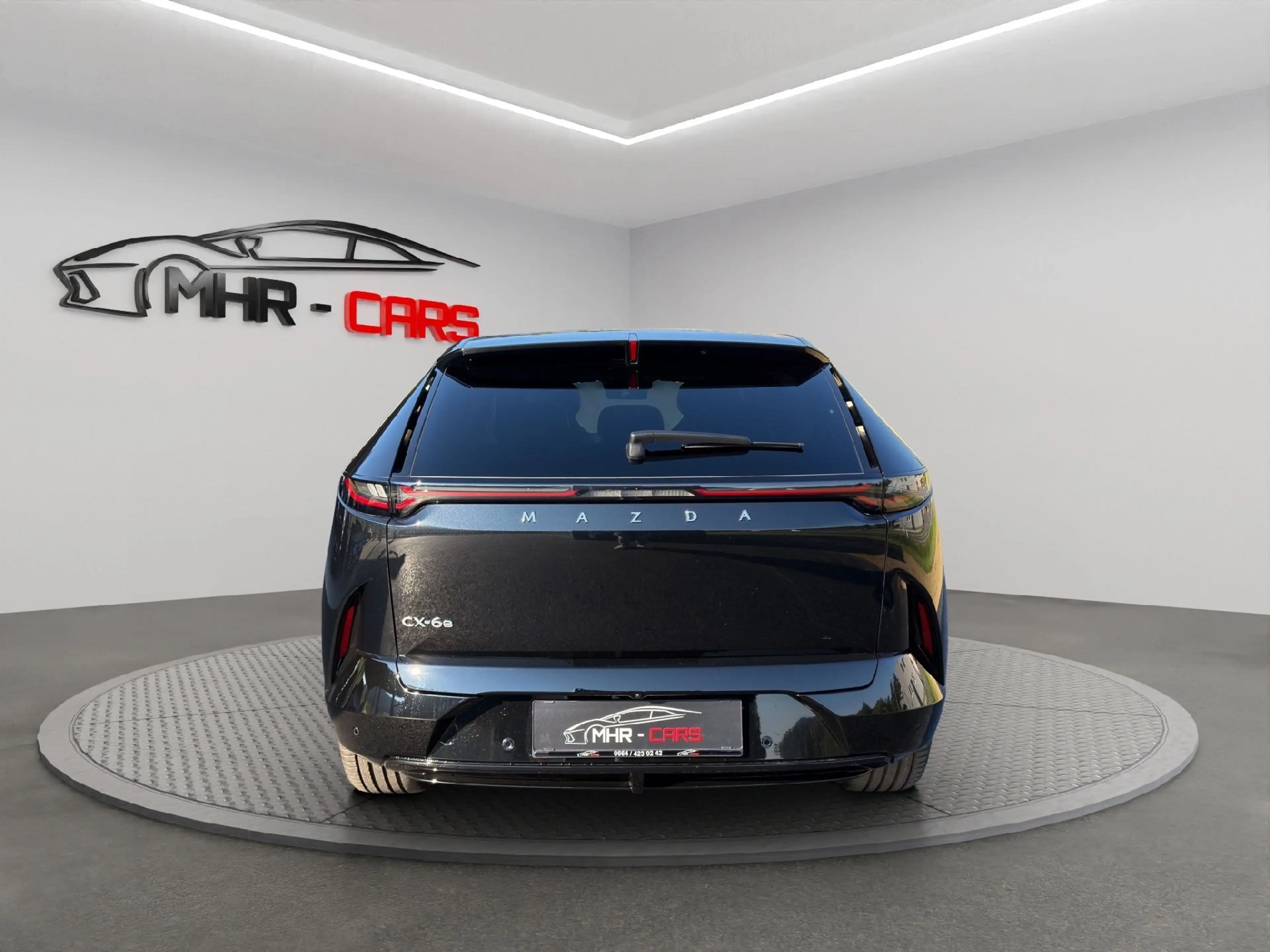 Mazda CX-6e EV Takumi — photo 4