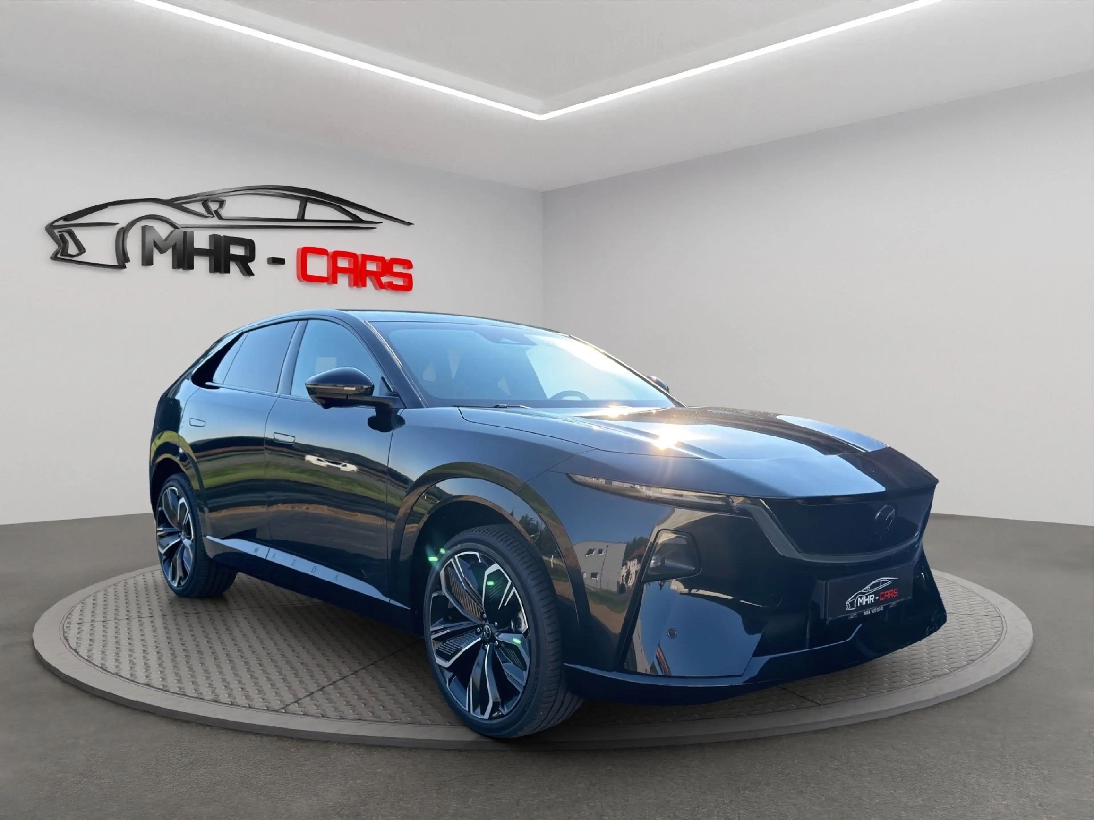 Mazda CX-6e EV Takumi — photo 7