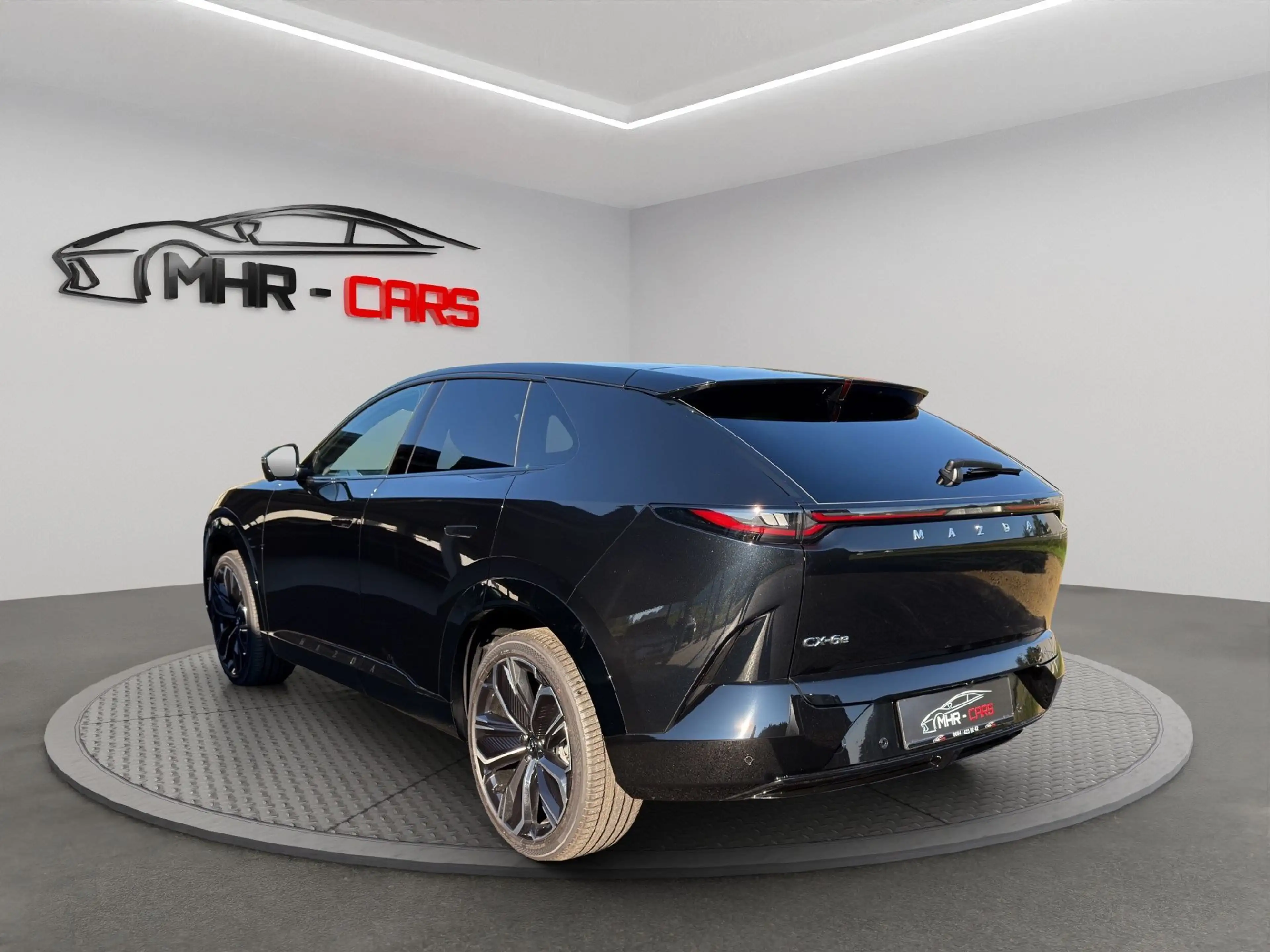 Mazda CX-6e EV Takumi — photo 3