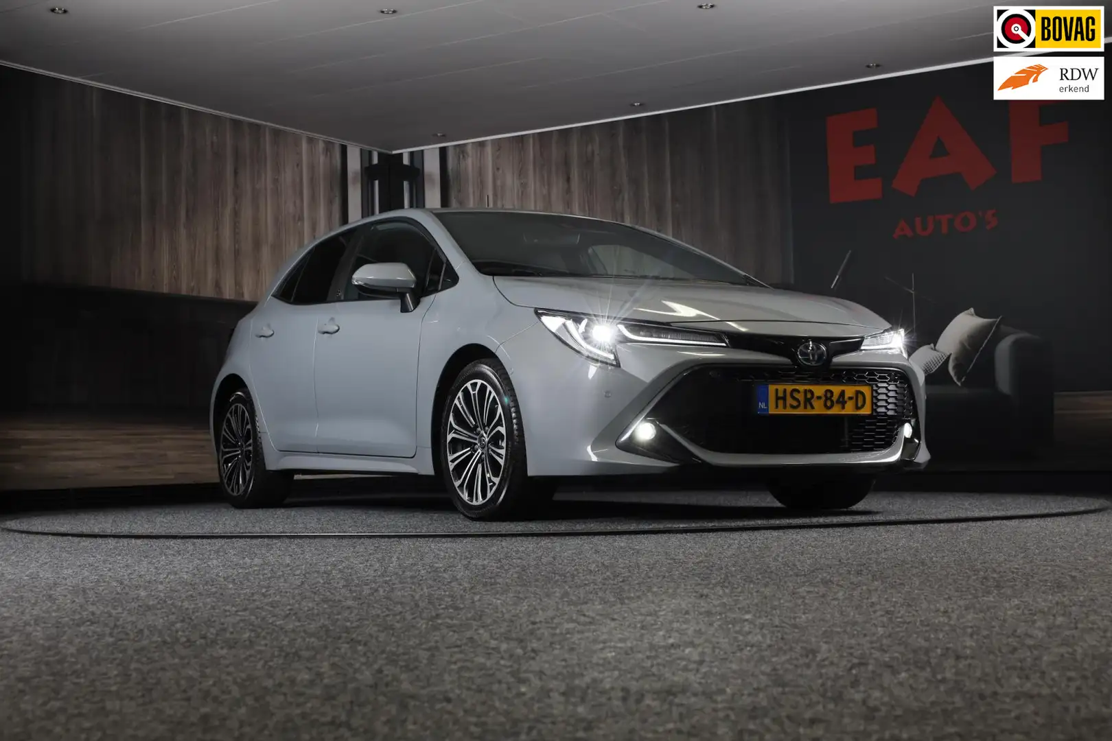 Toyota Corolla 1.8 Hybrid Business Plus / Aut / Camera / Acc / La Grijs - 1
