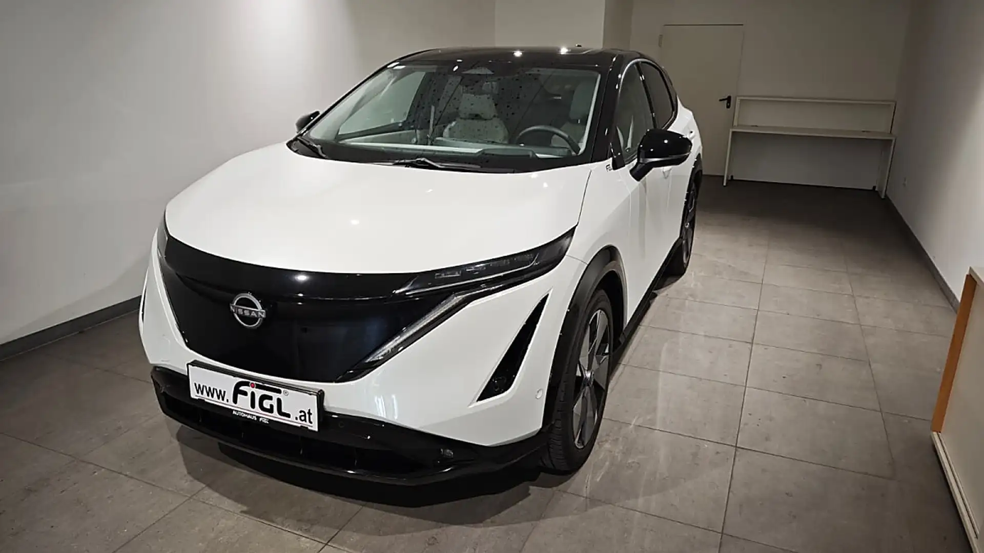 Nissan Ariya 87kWh e-4ORCE Evolve Aut. Weiß - 1