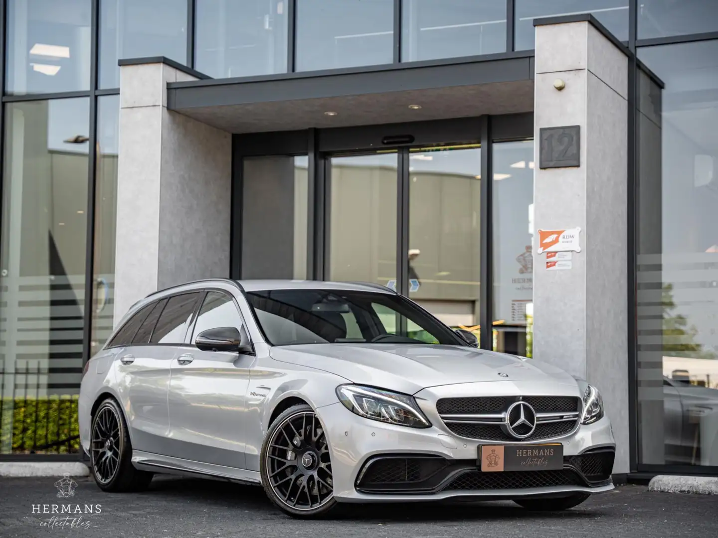 Mercedes-Benz C 63 AMG Estate / Full Carbon / Burmester / 360 / Memory Grijs - 1