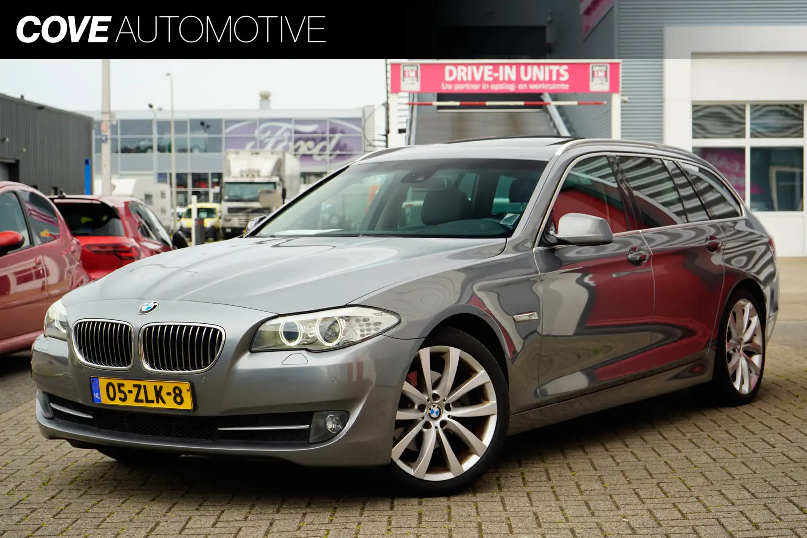BMW 520 5-serie Touring 520d High Executive | PANO | CRUIS Grijs - 1