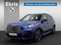 BMW iX1 eDrive20 67 kWh High Executive M Sportpakket / Pan Blauw - thumbnail 1