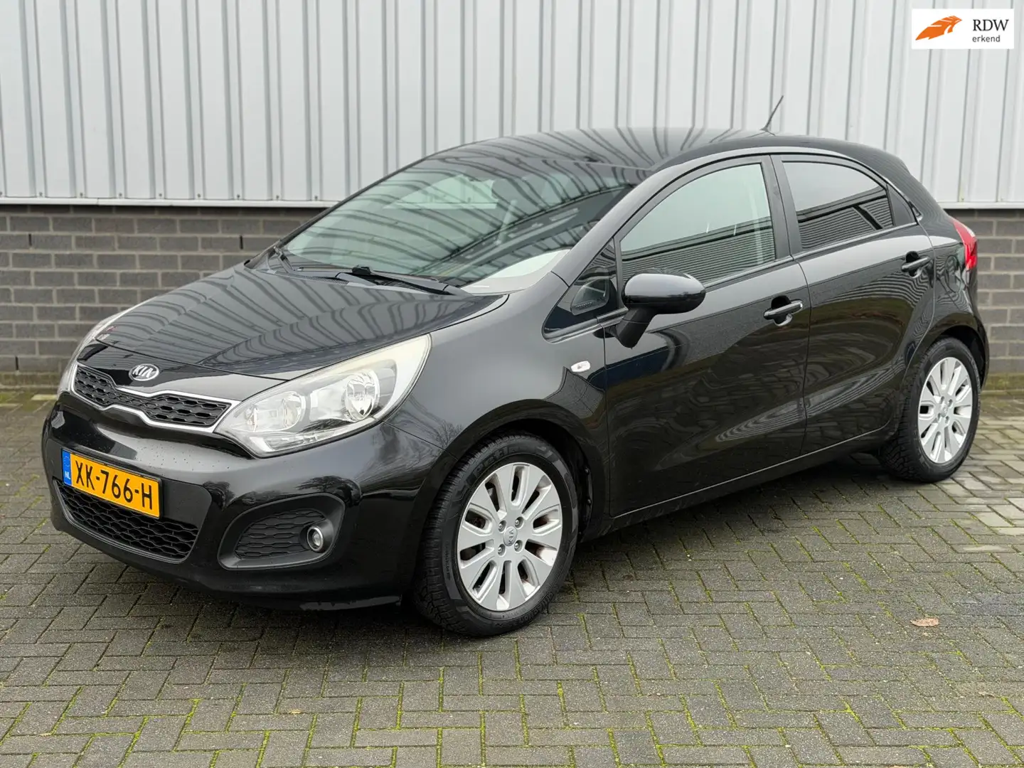 Kia Rio 1.4 CVVT Super Pack |Airco|CruiseCtrl|PDC|Stuur/st Nero - 1