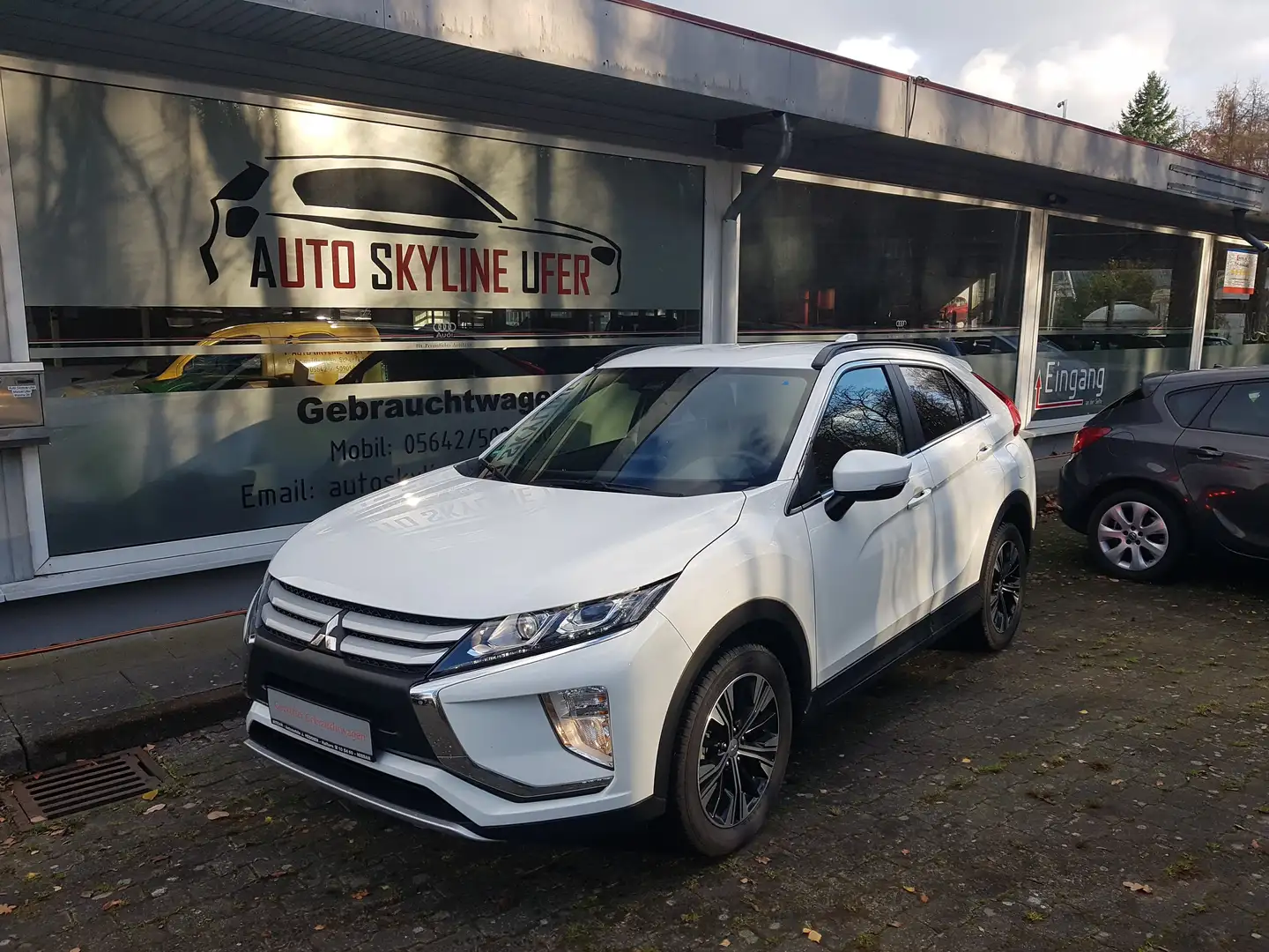 Mitsubishi Eclipse Cross Diamant Edition AUTOM+1HD+CHECKHEFT+SH+NAVI+KAMERA Weiß - 1