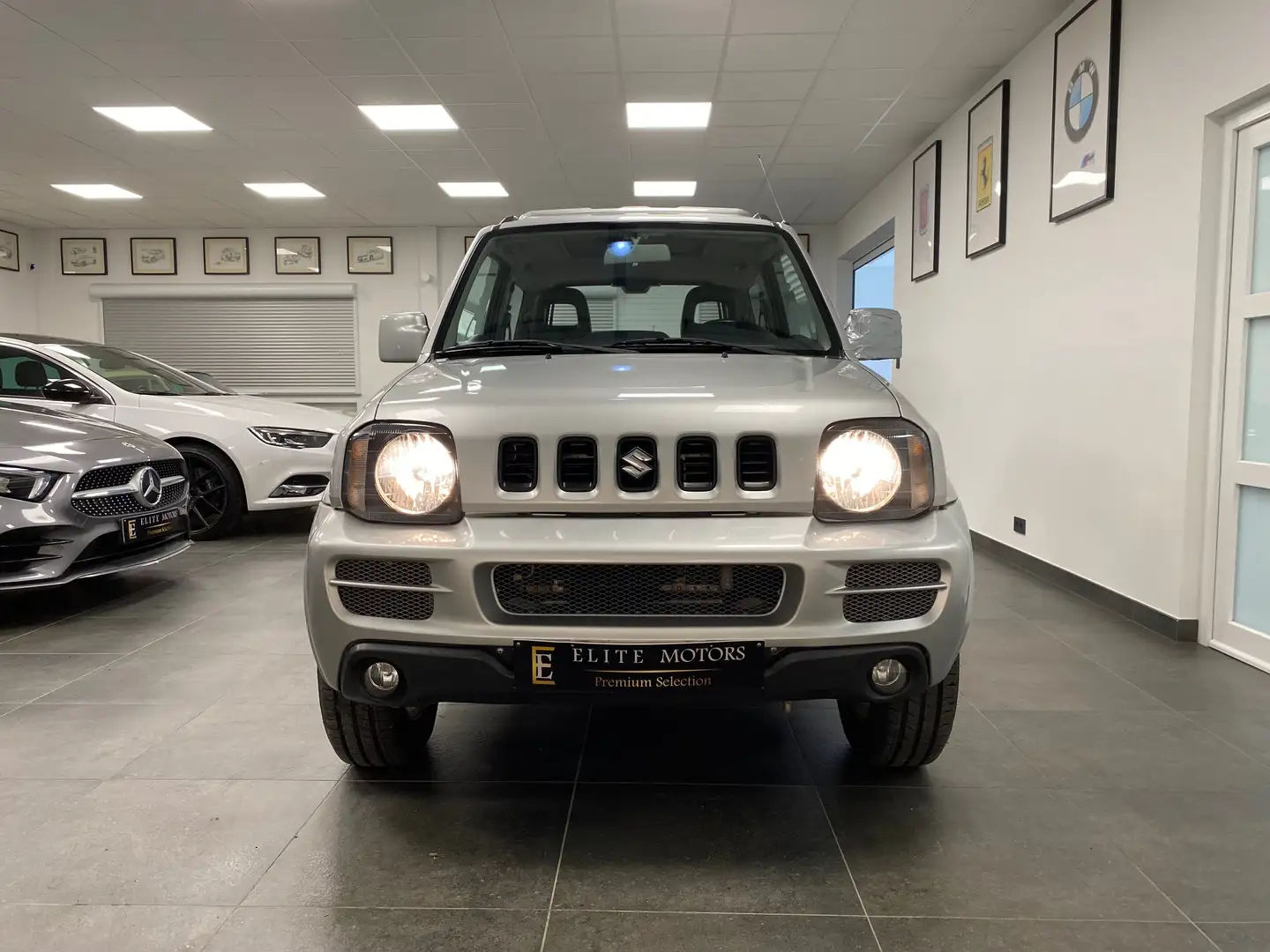 Suzuki Jimny 1.3i JLX BLUESKY/ CLIM/ PANO OUVRANT/ 1erMAIN Plateado - 2