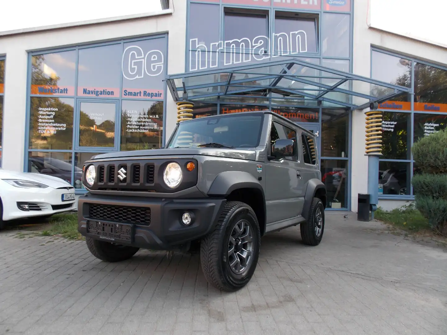 Suzuki Jimny 4 Sitzer"Navi"LED"ALU"AHK Gris - 1