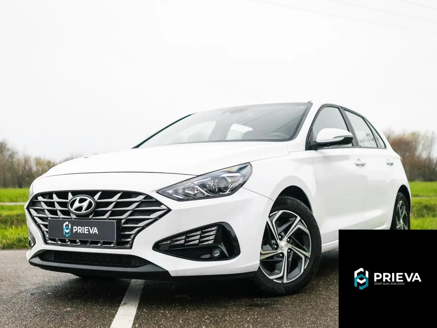 Hyundai i30 1.0 T-GDI Essential *Camera, Apple CarPlay* Wit - 1