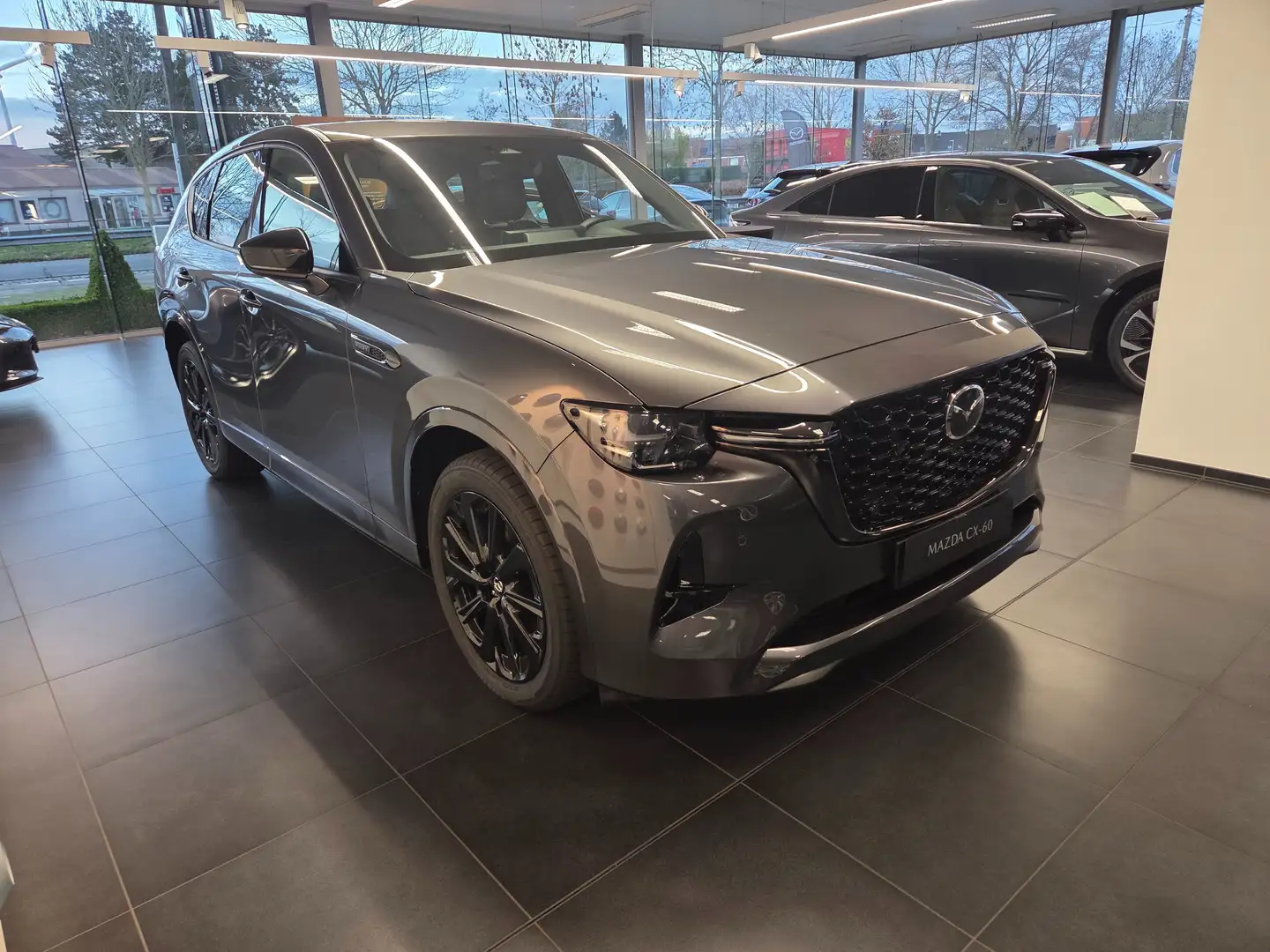 Mazda CX-60 CX-60 AWD PHEV Aut. HOMURA Grijs - 1