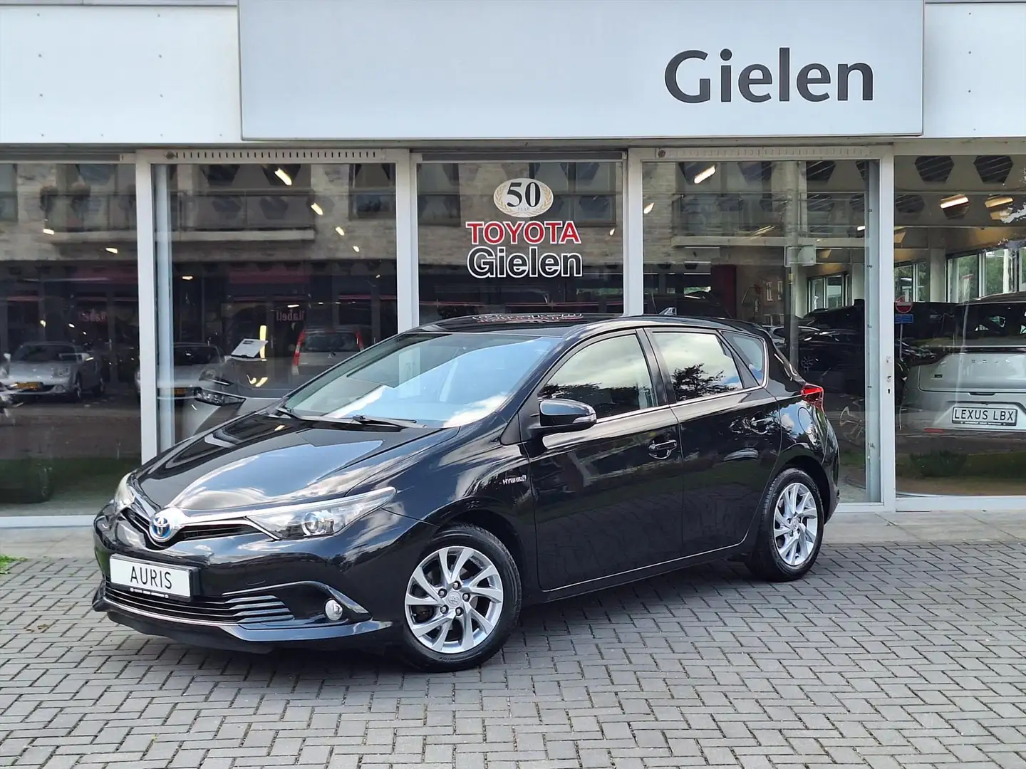 Toyota Auris 1.8 Hybrid Dynamic | Navigatie, 16 inch, Parkeerca Noir - 1