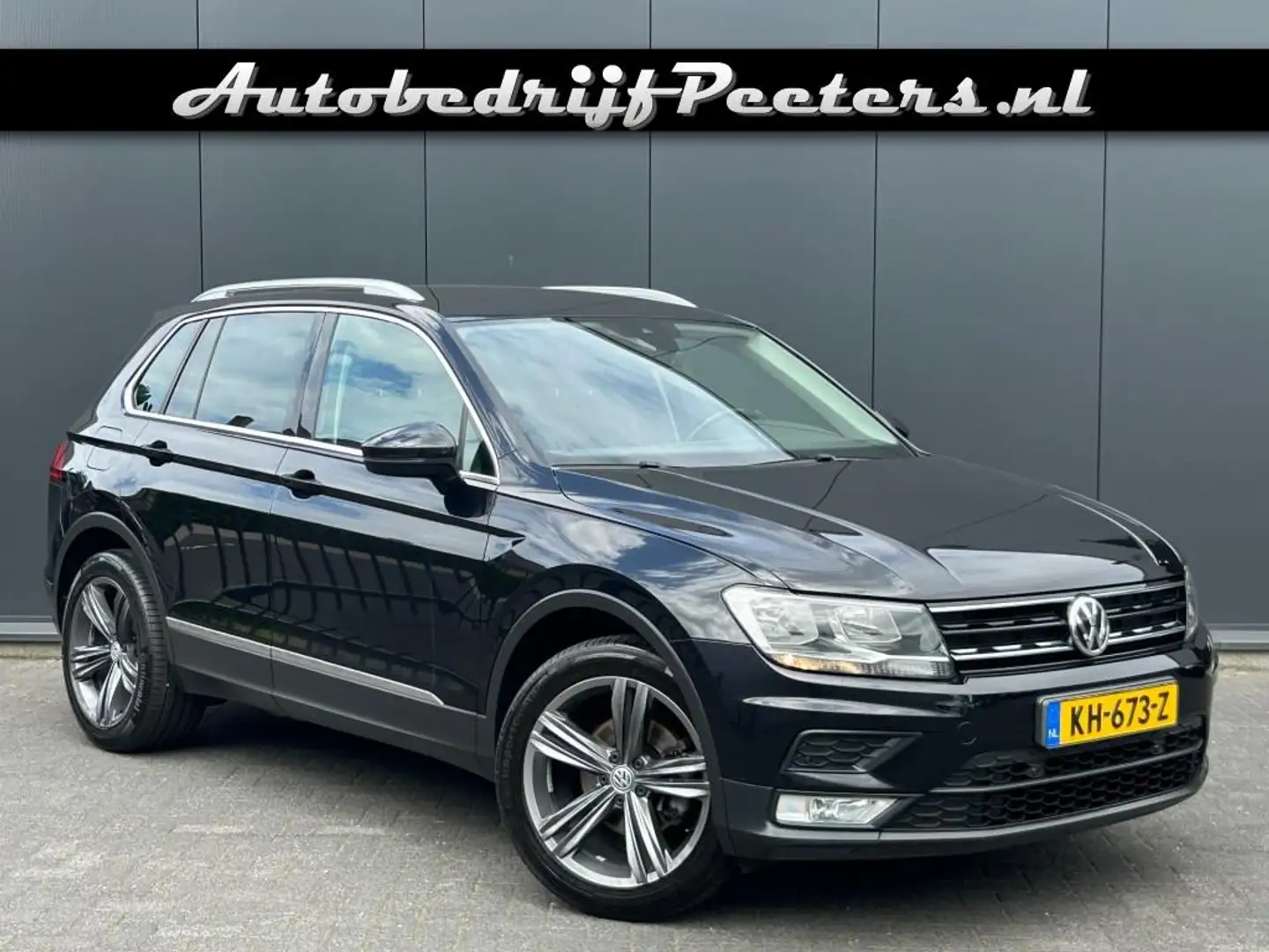 Volkswagen Tiguan 1.4 TSI Connected Navi Carplay Cruise PDC P.glas T Zwart - 1
