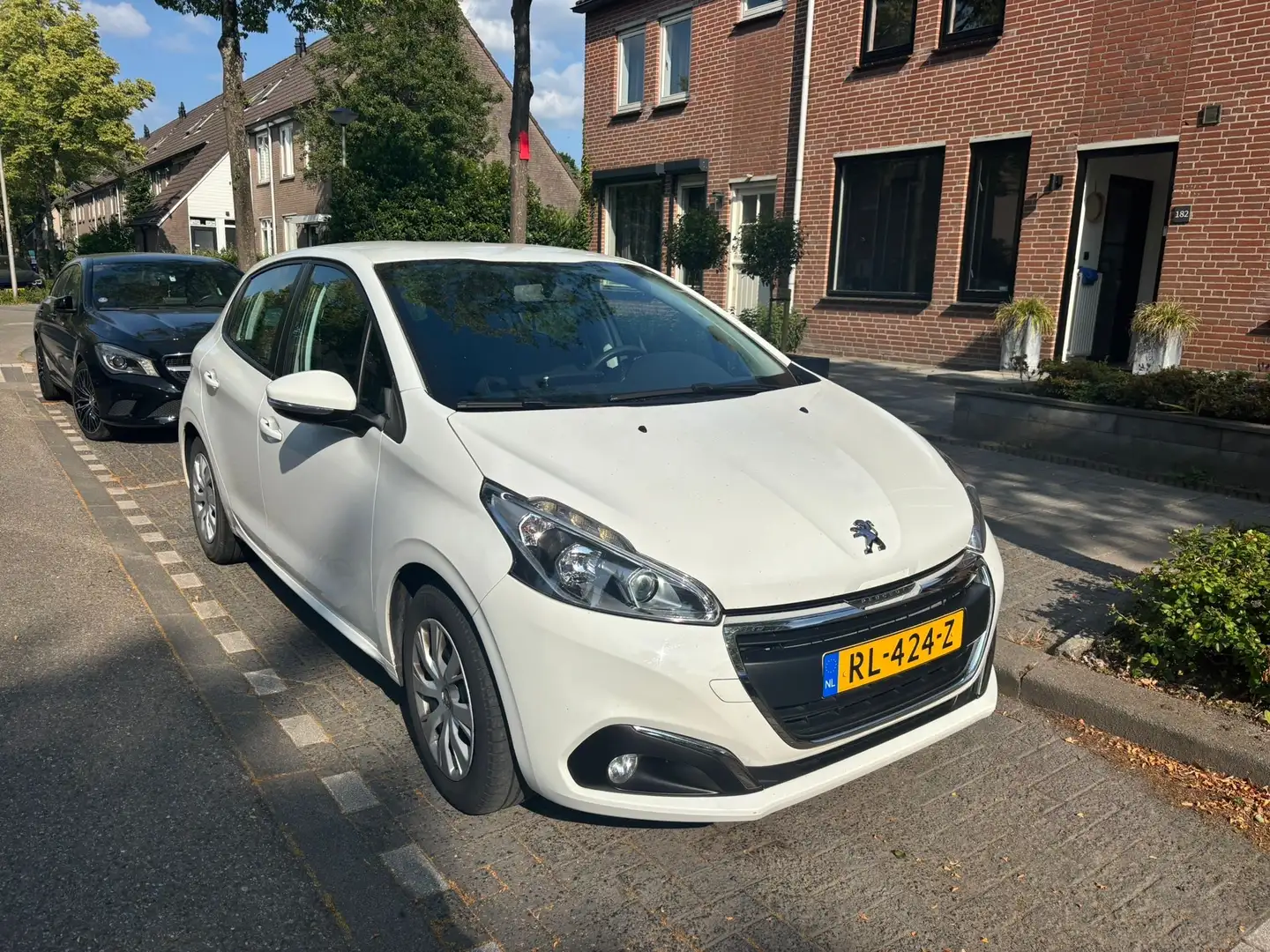 Peugeot 208 1.2 PureT. Blue Lion Wit - 1