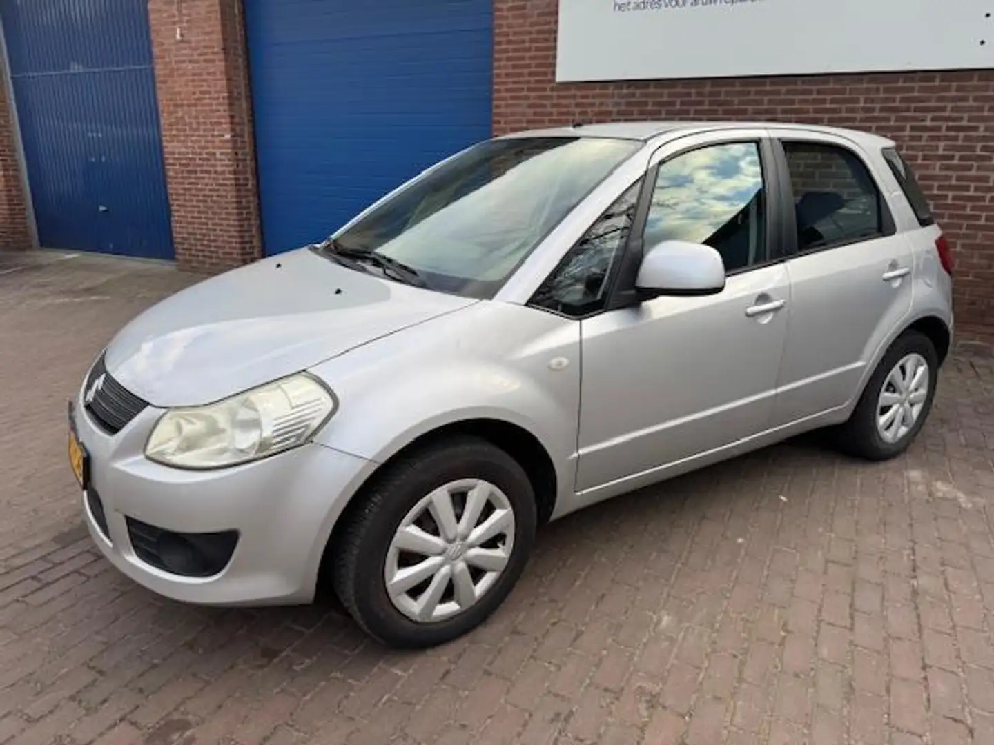 Suzuki SX4 1.6 Exclusive Airco, Trekhaak, Centr. Vergrendelin Gris - 2