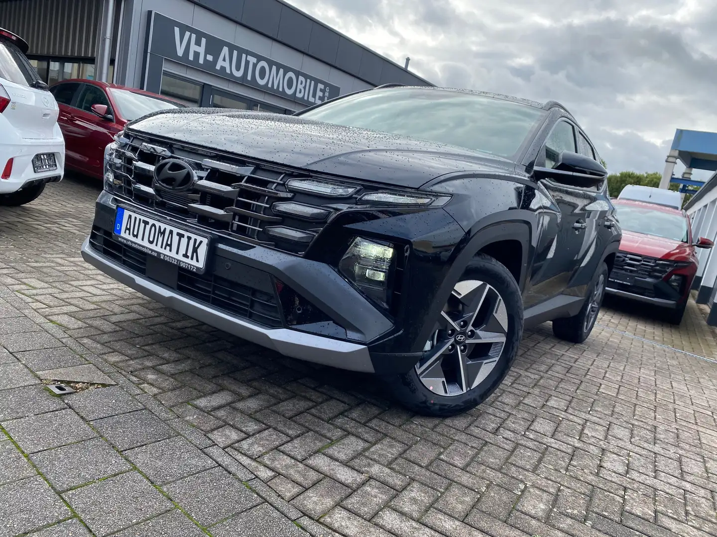 Hyundai TUCSON DCT*el.Sitze*NAVI&R.KAM&PDCvo&hi*Totwinkel*WinterP Schwarz - 1