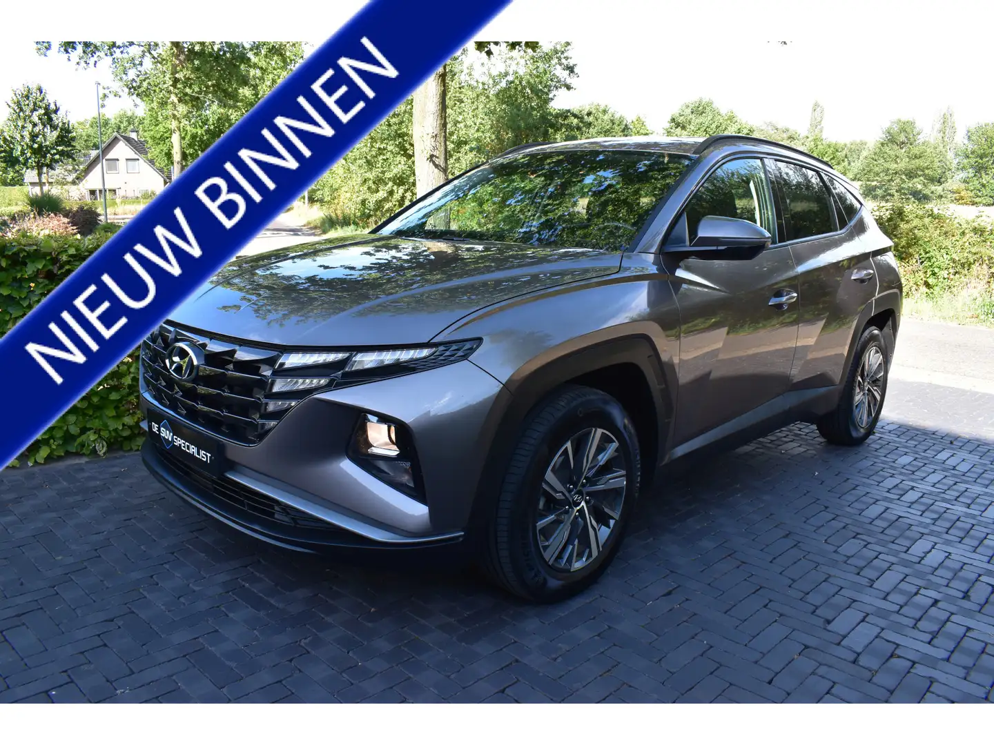 Hyundai TUCSON 1.6 T-GDI HEV Comfort 180PK NIEUWSTAAT! Gris - 1