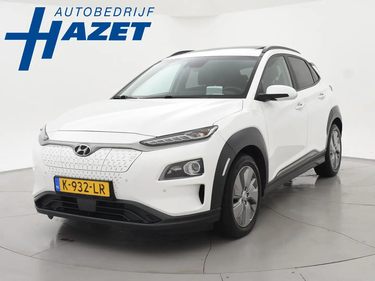 Hyundai KONA EV PREMIUM SKY 64 KWH + SCHUIFDAK | LEDER | TREKHA Weiß - 1
