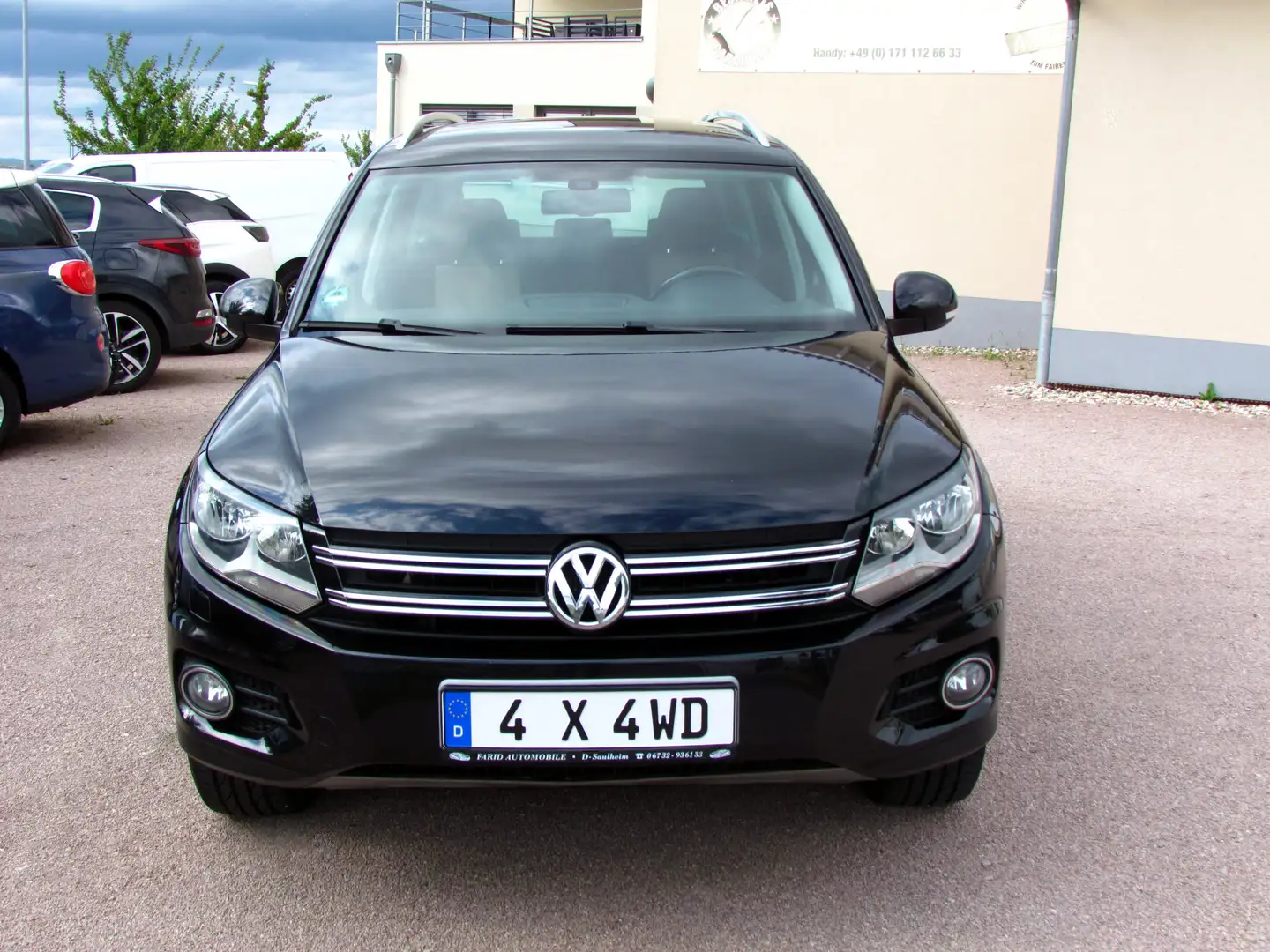 Volkswagen Tiguan 1,4 TSI Track & Style 4Motion* EURO 5* Schwarz - 2