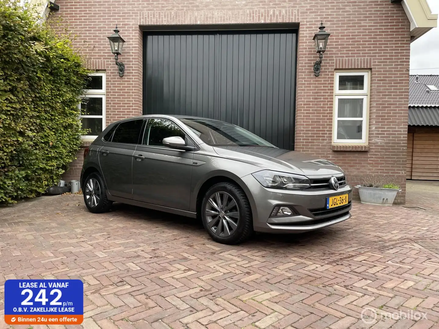 Volkswagen Polo 1.0 TSI Highline Dealer Clima Cruise Stoelvw Grijs - 1