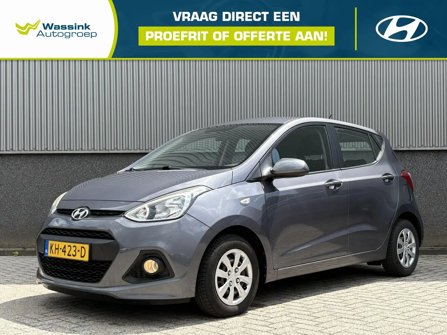 Hyundai i10 1.0i Blue 66pk i-Motion Comfort | Trekhaak | Cruis Grijs - 1