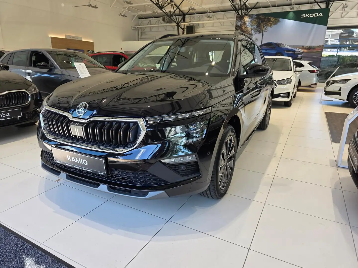 Skoda Kamiq Tour 1.0 TSI DSG #AHK Schwarz - 1