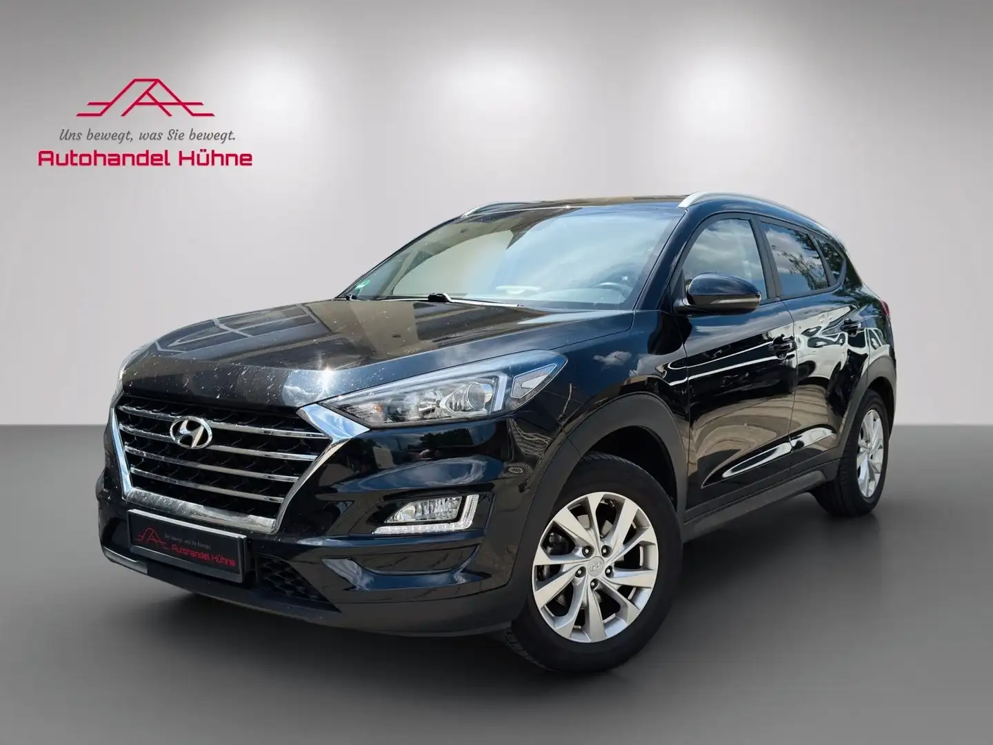 Hyundai TUCSON 1.6/Navi/AHK/8 Fach Bereift Schwarz - 1