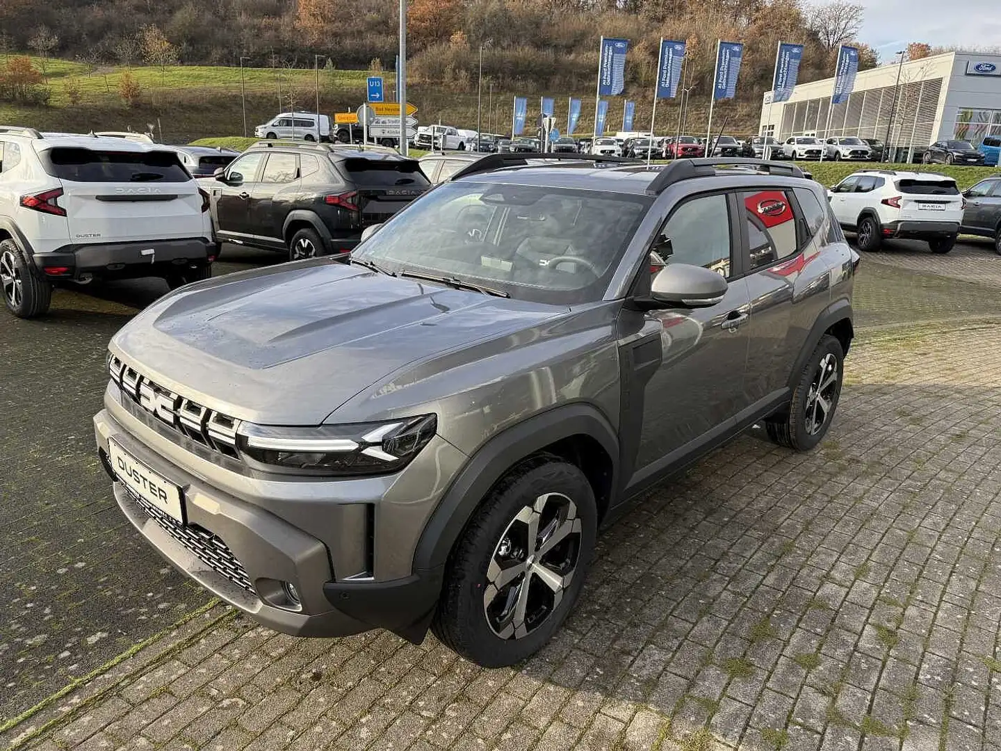 Dacia Duster 3 Journey MH TCe130 Navi Klima SHZ PDC+Kamera 360° Grau - 1