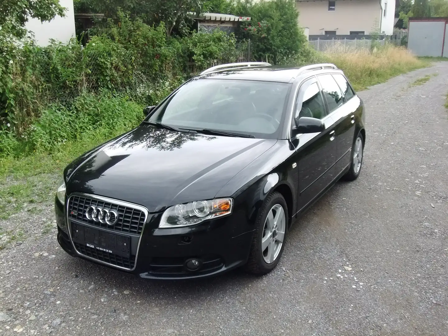 Audi A4 2.0 TDI quattro (103kW) Schwarz - 1