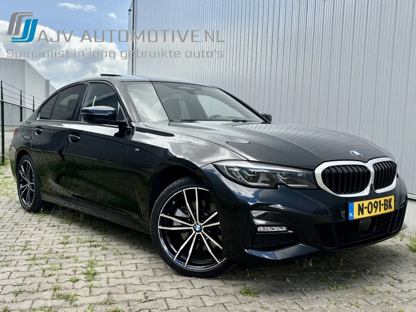 BMW 320 3-serie 320e M-SPORT BUSINESS EDITION PLUS / OPEN Zwart - 1