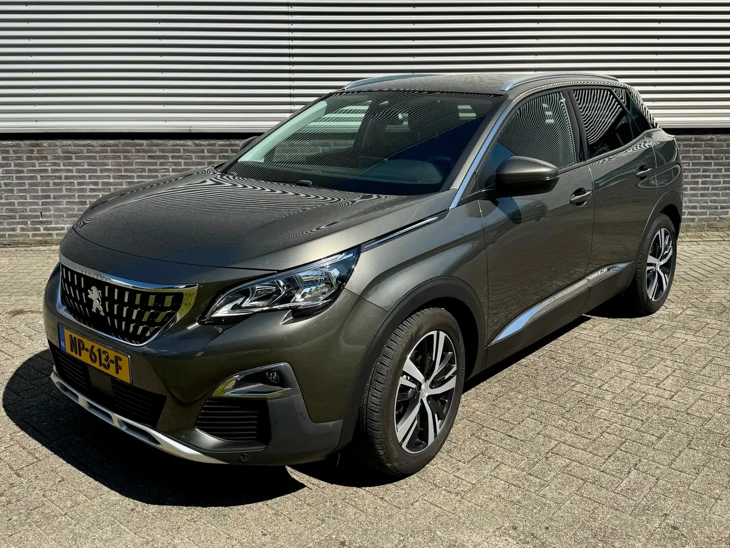 Peugeot 3008 1.2 PureTech Prem. Grijs - 1