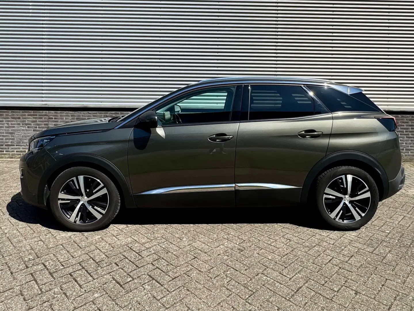 Peugeot 3008 1.2 PureTech Prem. Grijs - 2