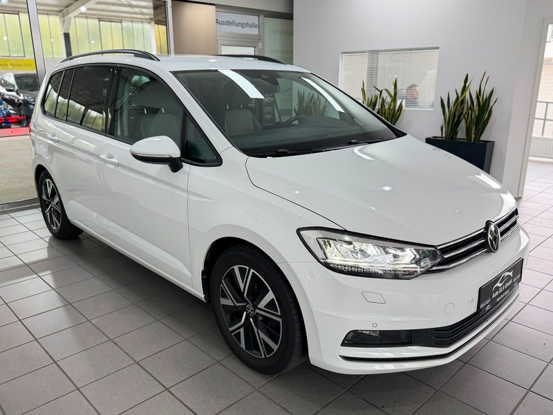Volkswagen Touran 1.5 TSI 1.Hand|7 Sitze|AHK|Kamera — photo 10
