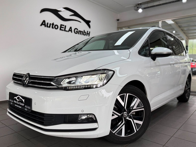 Volkswagen Touran 1.5 TSI 1.Hand|7 Sitze|AHK|Kamera — photo 4