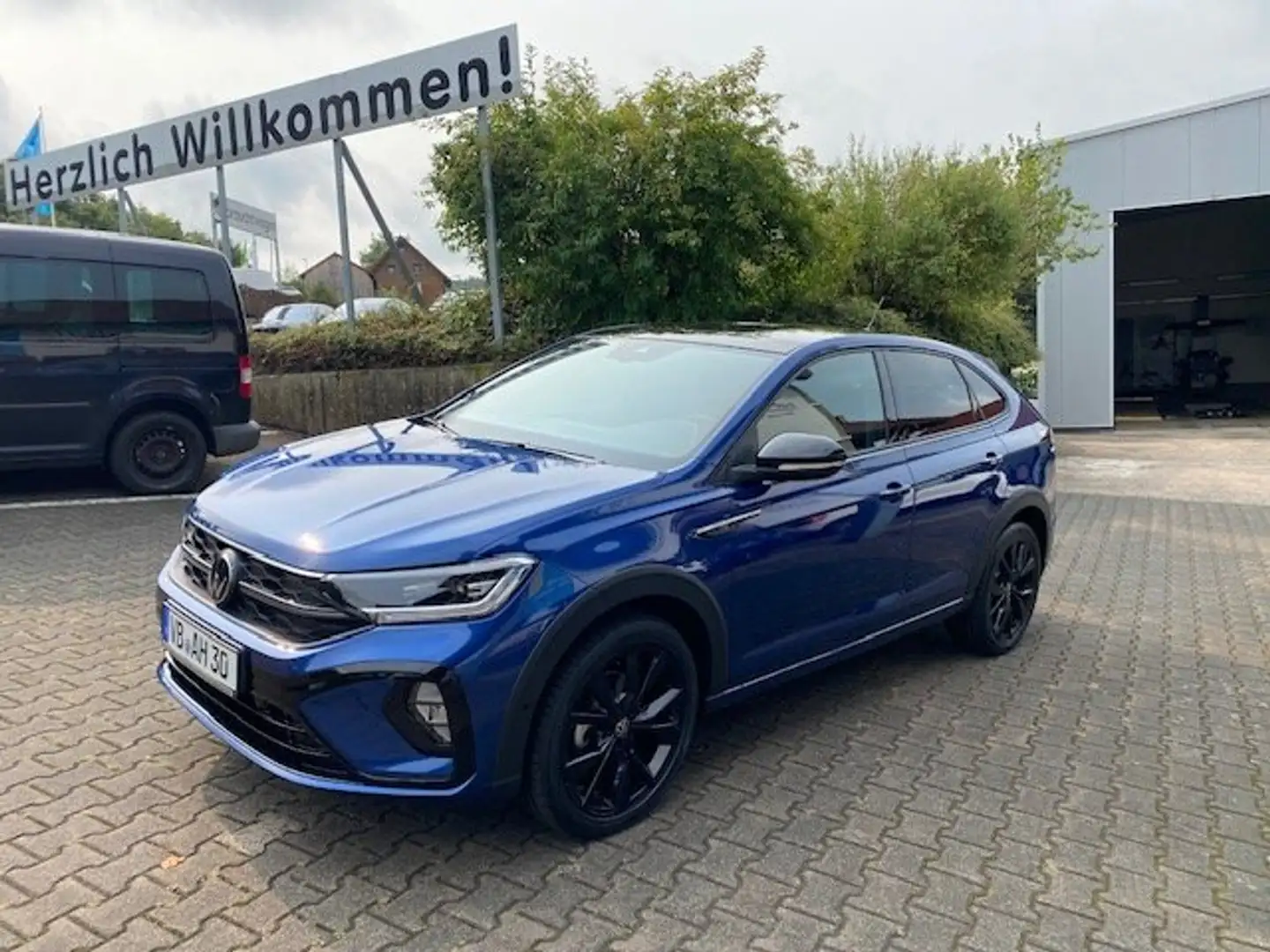 Volkswagen Taigo 1.5TSI DSG R-Line *Garantie 27*Navi*Beats*Panorama Blauw - 1