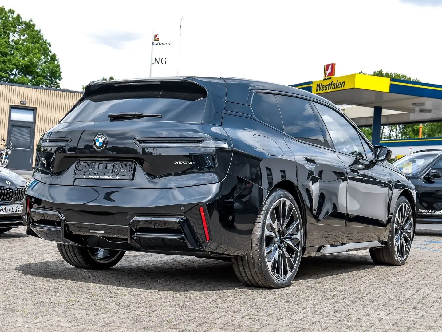 BMW iX xDrive45 M Sport Pro Sky Lounge Luftfederung 360° Schwarz - 2