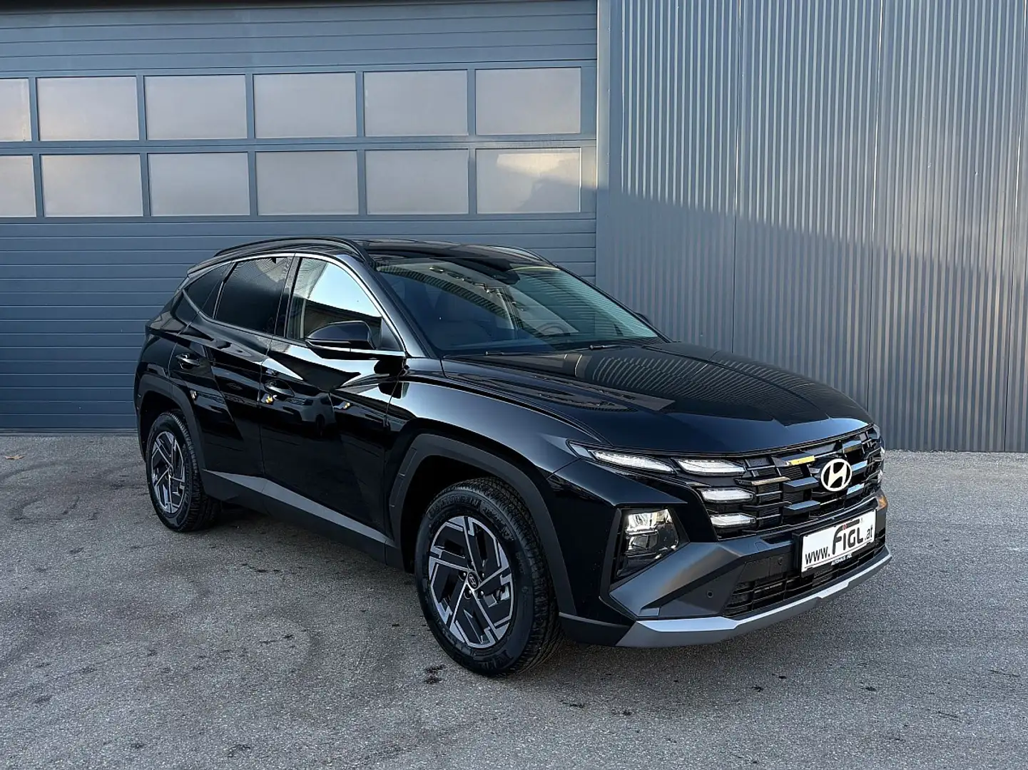 Hyundai TUCSON Tucson 1,6 T-GDI HEV 4WD Jubilé Aut. Schwarz - 1
