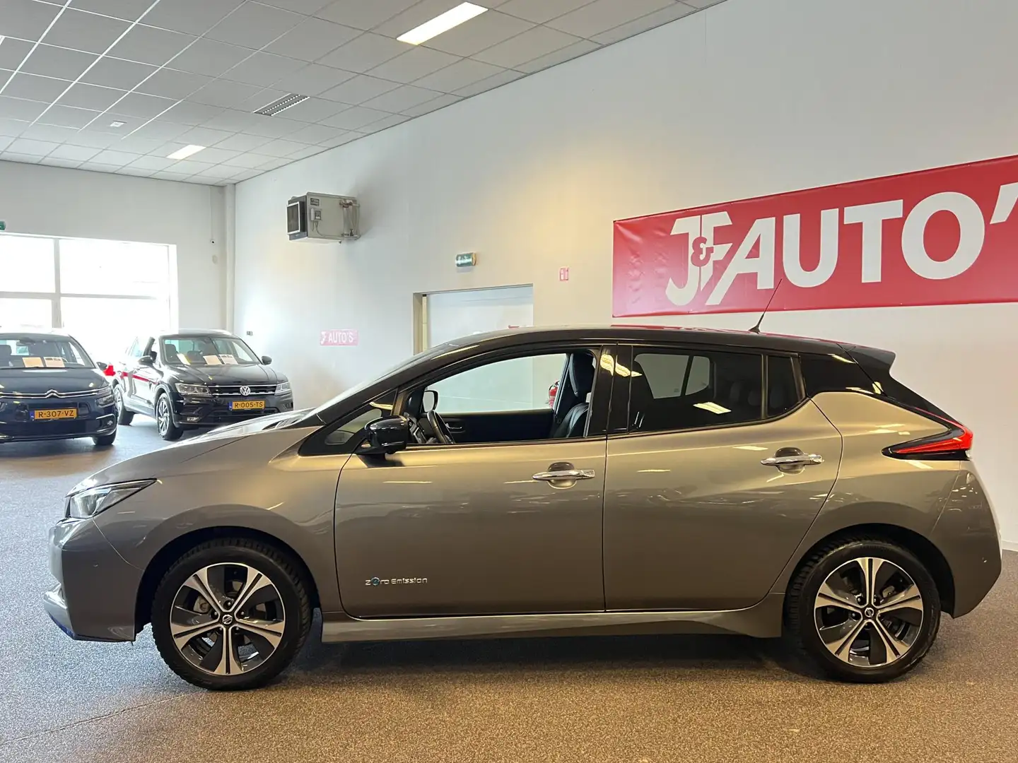 Nissan Leaf e+ TEKNA 62 kWh LEER, NAVIGATIE/CAMERA, CRUISE, 21 Grijs - 2