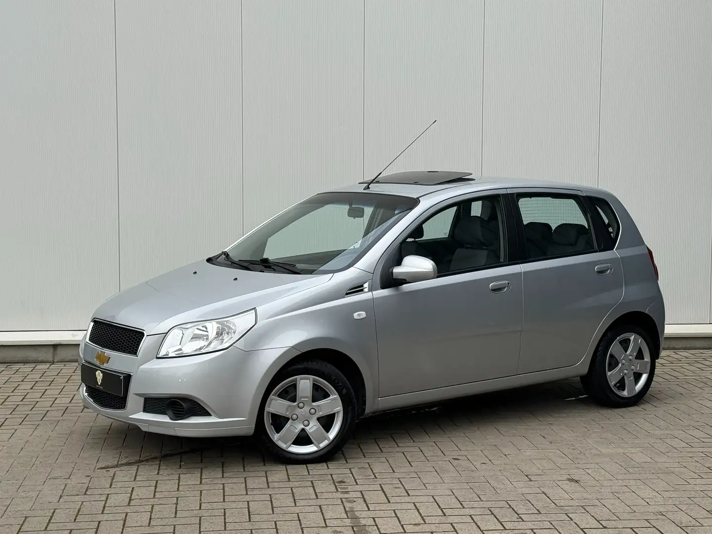 Chevrolet Aveo ✅1.2 i GARANTIE Airco Trekhaak Open Dak 1.Eig - 1