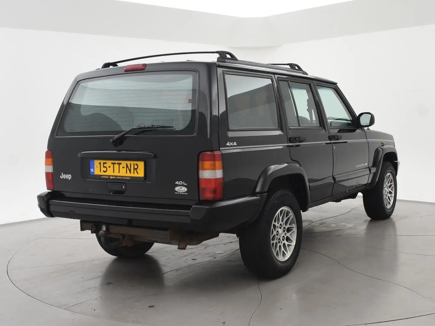 Jeep Cherokee 4.0i 4X4 AUT. LIMITED + LEDER / 3250 KG TREKHAAK Schwarz - 2