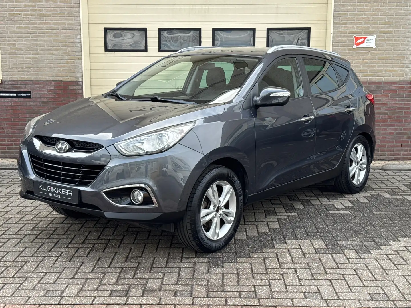 Hyundai iX35 2.0i Style Airco | Clima | Navi | Camera | Cruise Grijs - 1
