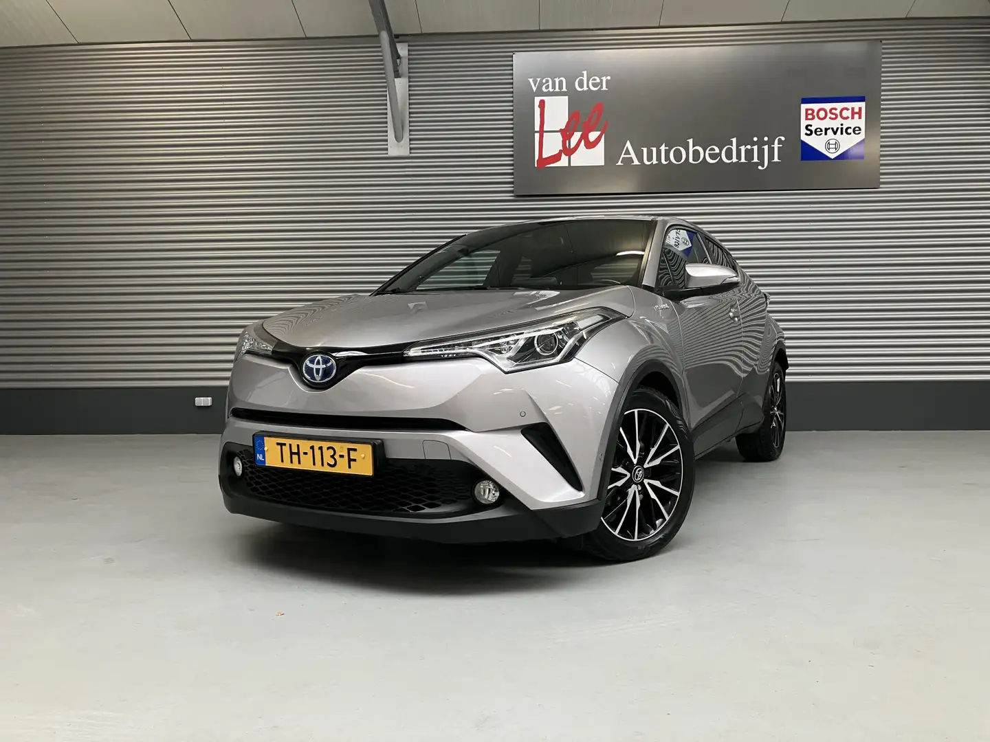 Toyota C-HR 1.8 Hybrid EXECUTIVE/LED/PDC/CAM/DODE HOEK/JBL/NAV Gris - 1